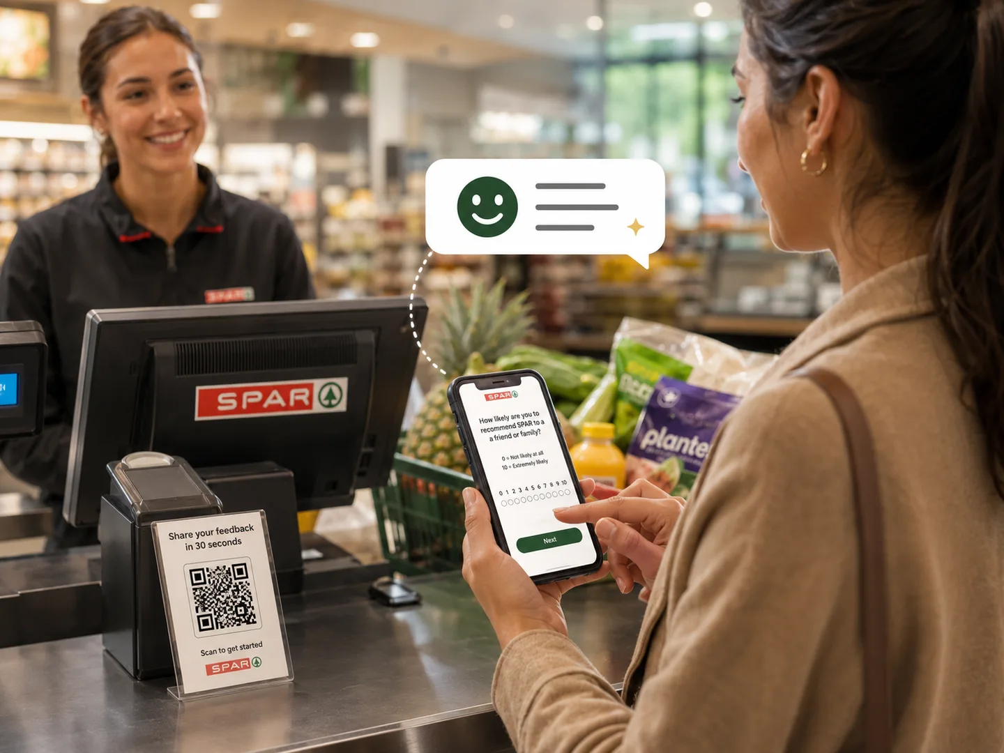 SPAR checkout with a QR code stand reading "Share your feedback", a customer answering the NPS question in the chat dialog on her smartphone